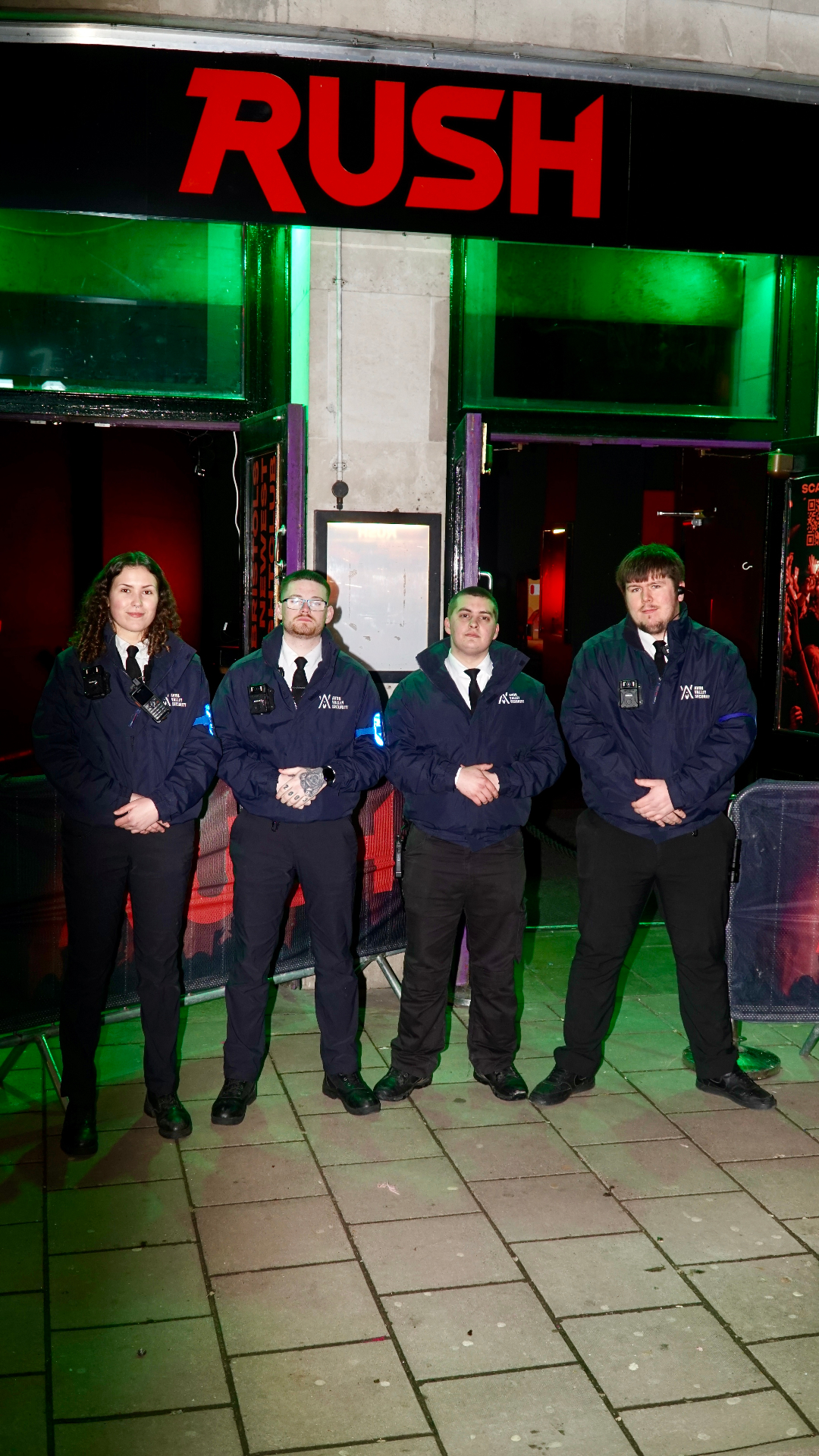 SIA-licensed door supervision team on duty at a Bristol nightclub entrance
